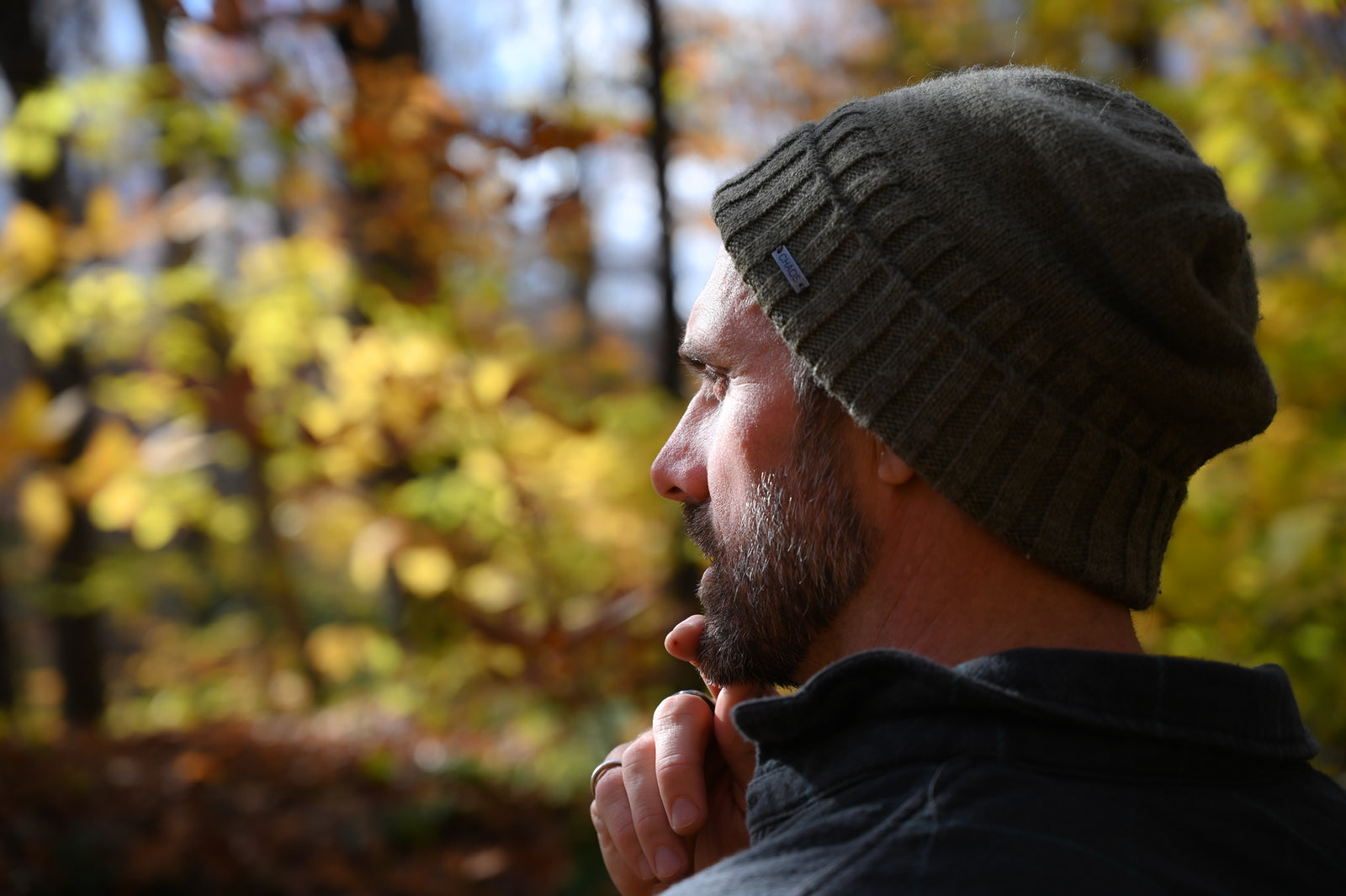 Aeemelia Skincare 4 common skincare myths. Image showing male model and aeemelia co-owner pondering the myths in the forest. 